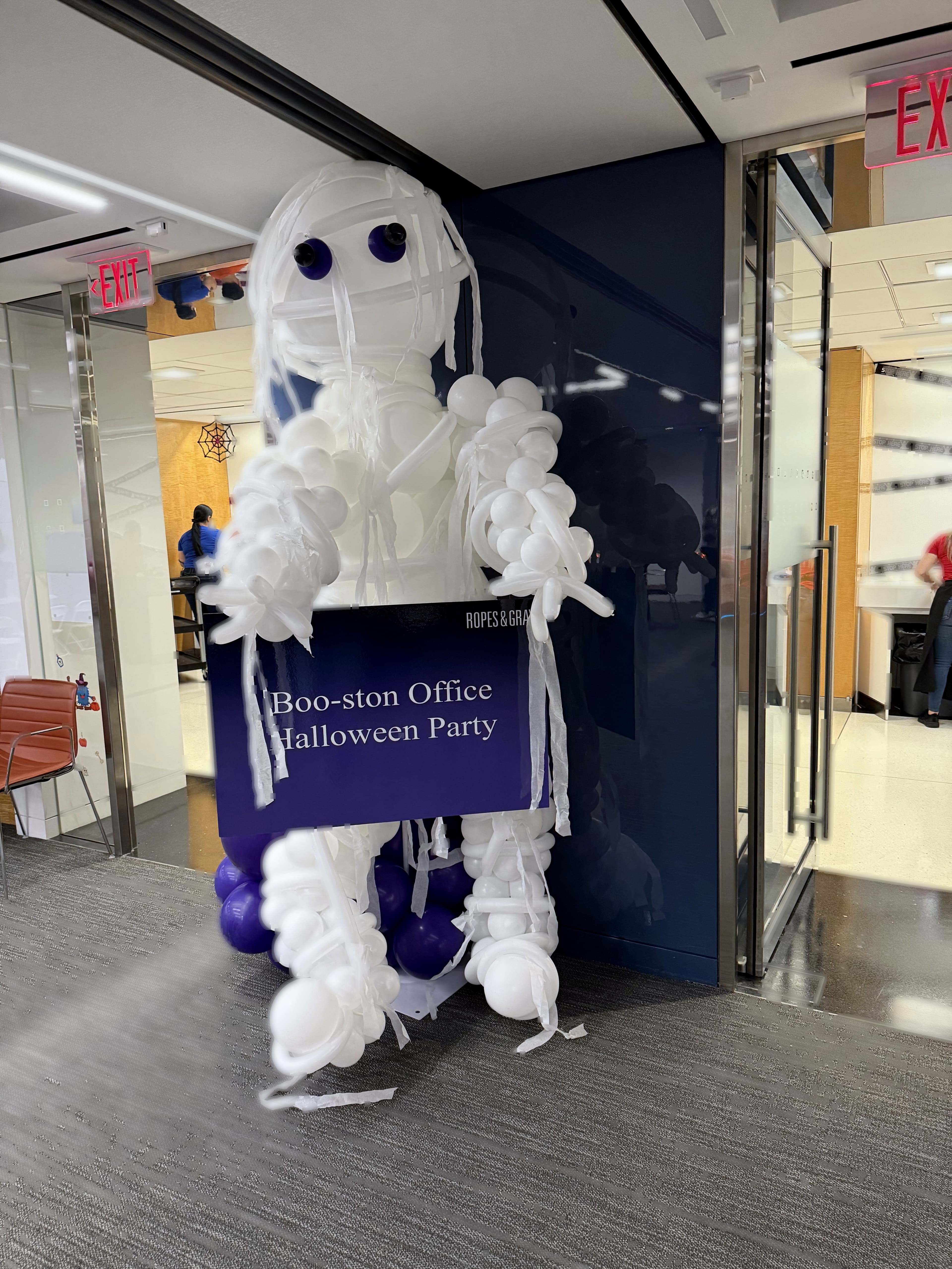 Mummy-themed balloon greeter sculpture for a corporate Halloween event